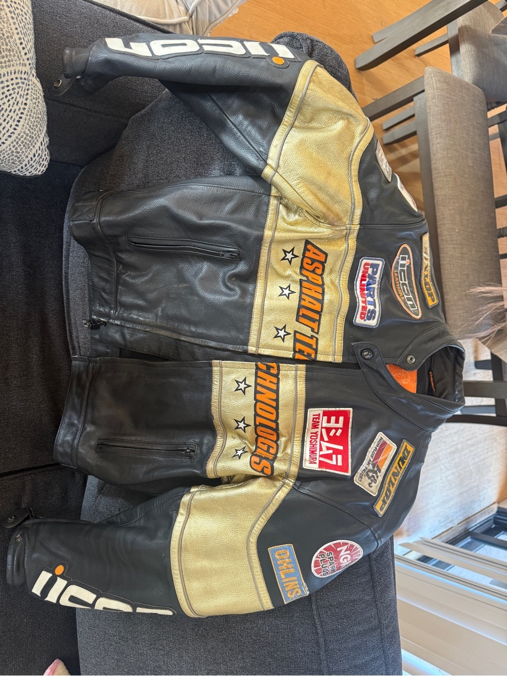 ICON Black Leather Jacket with Orange Label Accents